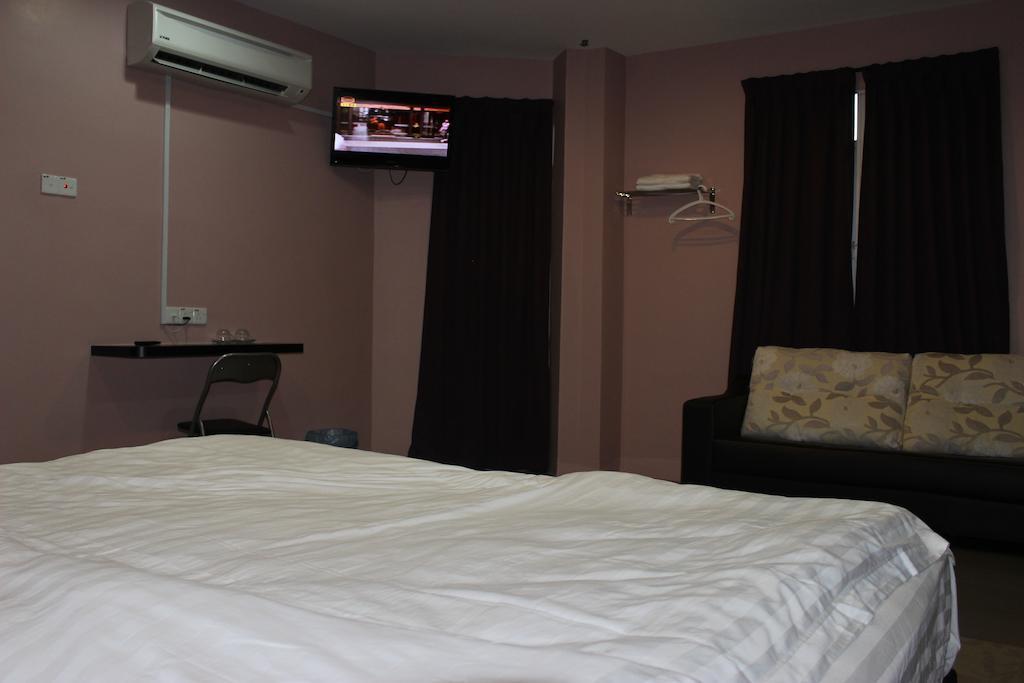 Inn Hotel Телук-Интан Номер фото